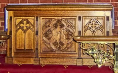 The beautifully carved communion table in the chapel