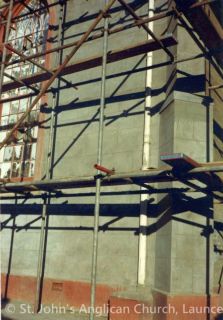 Cement rendering of NW corner - marked to give the appearance of large blocks b
