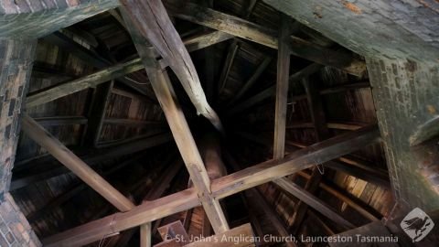 Original timberwork inside west tower cupola - taken 2015 - note the original, unsquared pole - presumably added to give the structure extra bracing against strong winds.