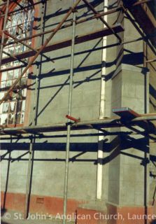 Cement rendering of NW corner - marked to give the appearance of large blocks b