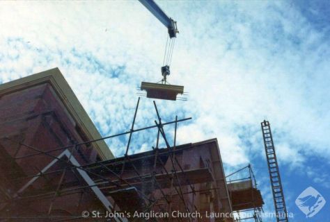 Parapet blocks being lifted b