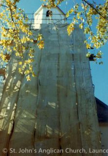 West tower scaffolding - scrim to protect against falling plaster
